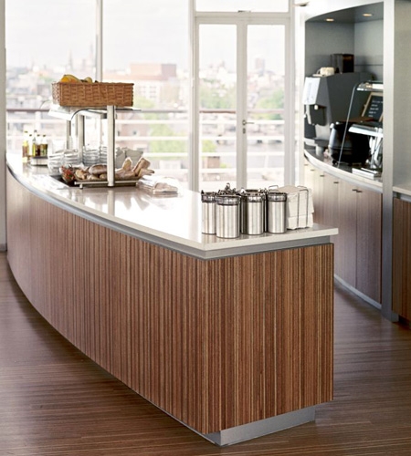Plexwood® Consultancy Firm floor with kitchen counter for the top-floor restaurant in re-lined surface ply veneers