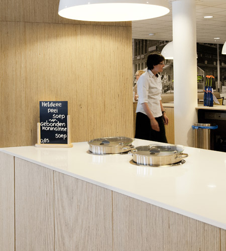 Plexwood® De Meeuwbeemd Nursing Home canteen detail with storage cabinet and wall in deal re-clamped veneer ply