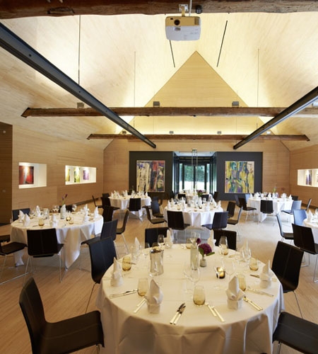 Plexwood® Kränholm Barn dining hall interior floor, wall, ceiling, cabinetry in birch quatersawn plywood veneer products