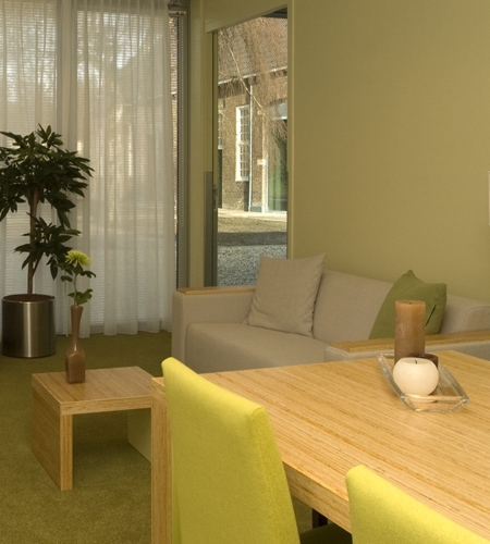 Plexwood® Kranenburg reception tables and furniture armrails of pine sandwich structured composite edge-ply surfaces
