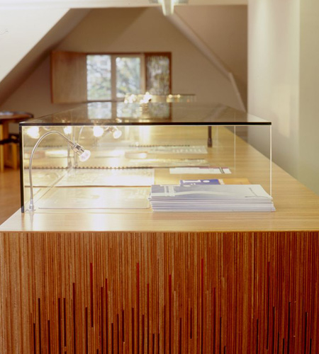 Plexwood® MuZIEum side view of a cnc processed museum display in ocoumé quartersawn plywood veneer