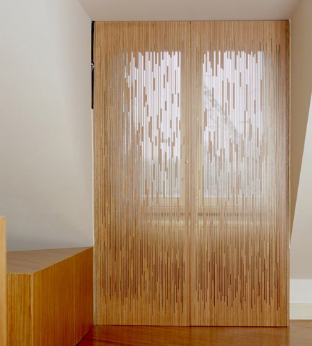 Plexwood® MuZIEum see-through window shutters in ocoumé vertical cut plywood veneer panels