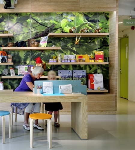 Plexwood® Nature Monuments table and open display cabinet in pine short side down plywood veneer
