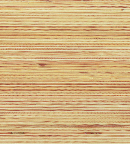 Plexwood® Pin grain de croix reconçu en tranches et empilés sur une surface de contreplaqué