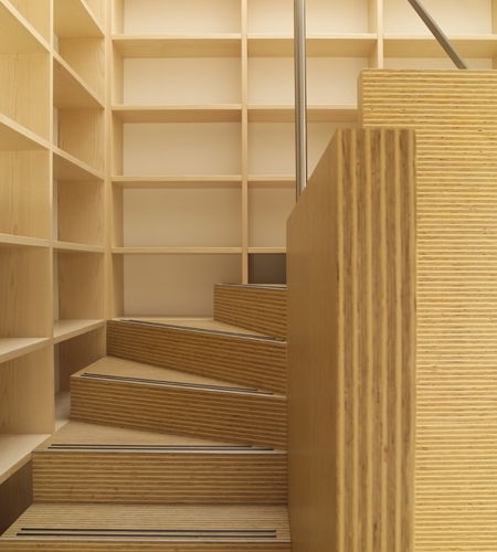 Plexwood® Rietveldplan house detail of a staircase with wall in matching deal edge plywood fineline veneers
