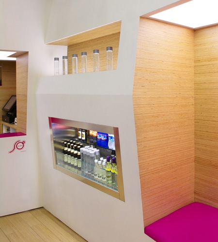 Plexwood® SoSushi detail of the sushi bar interior cladding with wall and floor in birch up-lined veneer panels