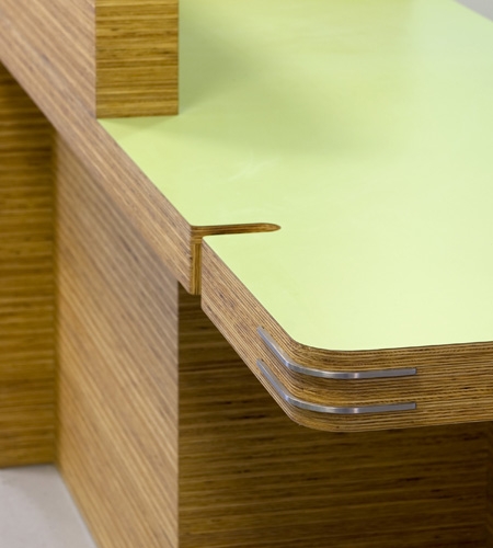 Plexwood® St. Olav's detail of a hospital desk in sandwich composite pine plywood with green HPL to