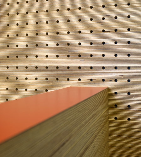 Plexwood® St. Olav's wall detail of cnc perforated acoustic veneer wood panels in pine laid-up sandwich ply