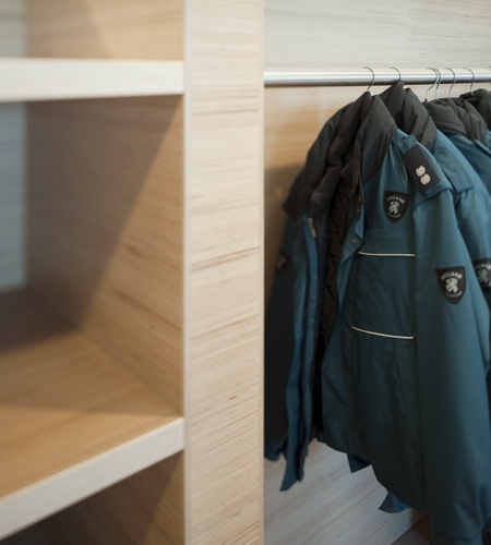 Plexwood® Tax and Border Security wardrobe detail in comprised plywood surface veneer paneling