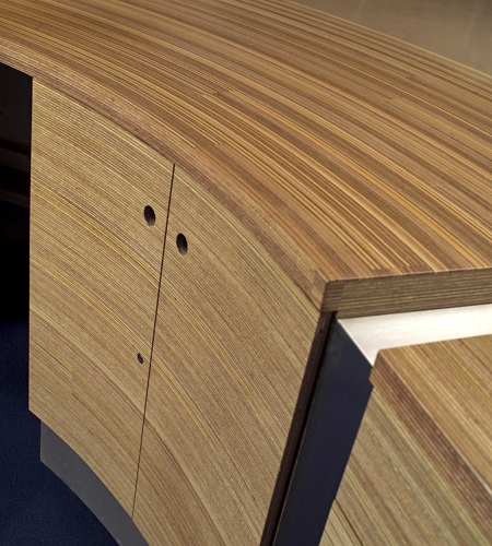 Plexwood® Van Hall Larenstein University curved door detail of the central information desk in meranti up-lined veneer