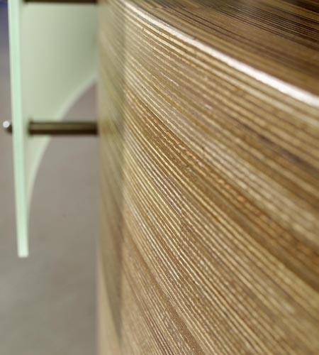 Plexwood® Van Hall Larenstein University curved top and front detail of the meranti glued-up plywood information desk