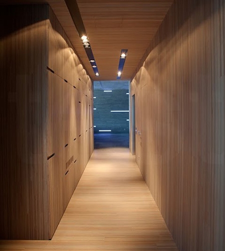 Plexwood® Villa Las Brisas open hallway floor, wall, doors, storage cabinetry and ceiling with integrated lights