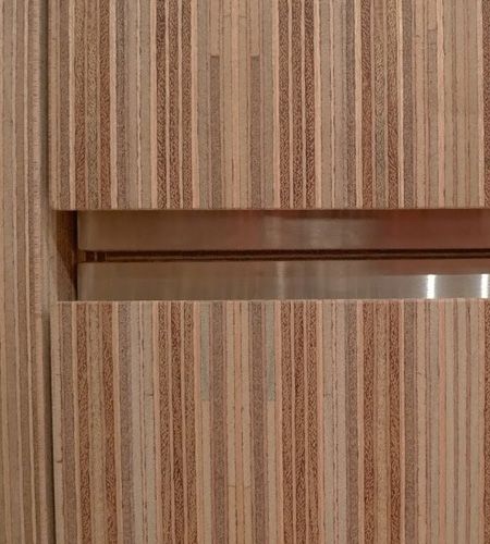 Plexwood® Storage cabinet detail in meranti stacked standing plywood sandwich veneer panels with RVS