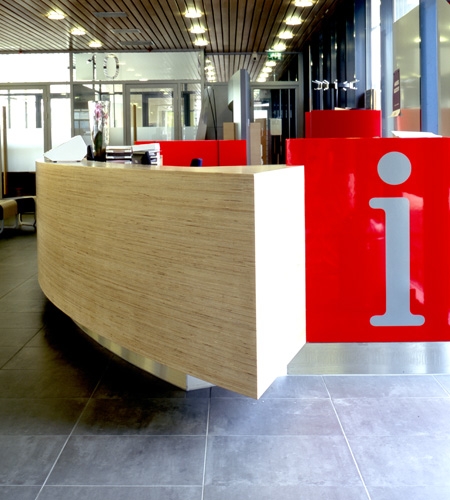 Plexwood® Zeeburg Community District Office information desk detail in birch plytype strip veneer
