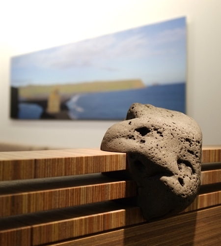 Plexwood® Iceland Air Keflavik airport Saga lounge wall detail with meranti partition wall and lava stone