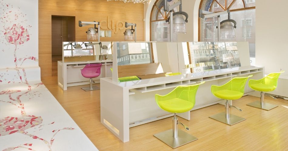Plexwood® Clip hairdresser store design concept with parquet floor, wall with matching logo, stairs and door