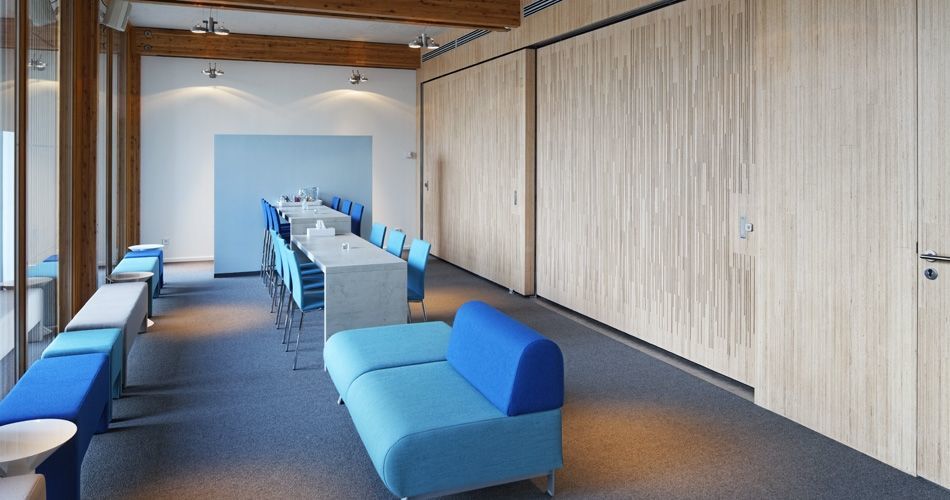 Plexwood® Cemetery De Nieuwe Ooster waiting room wall covering with semi-transparent doors in birch