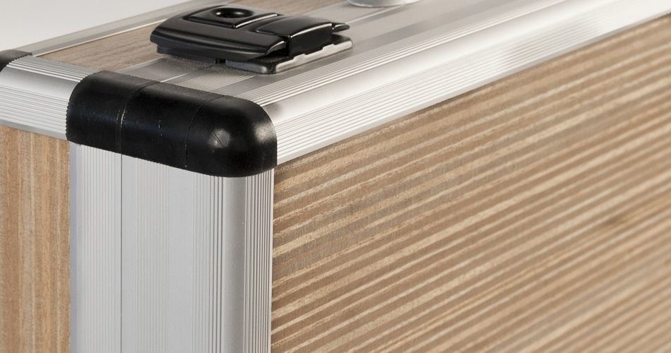 Plexwood® Gefken beech carrying case edge detail with engineered resurfaced micro-ply edge veneer sheets in metal framework
