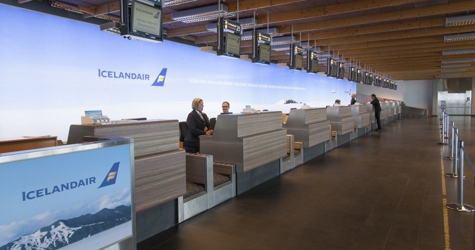 Plexwood® Iceland Air Keflavik airport check-in desks in meranti fire retardant safety design paneling