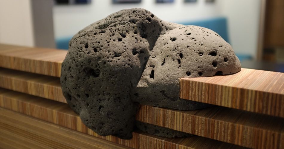 Plexwood® Iceland Air Keflavik airport Saga lounge wall detail with meranti partition wall and lava stone