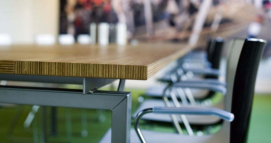 Plexwood® Nedbase conference table detail of the edges with stacked multiplex end-ply oak veneer