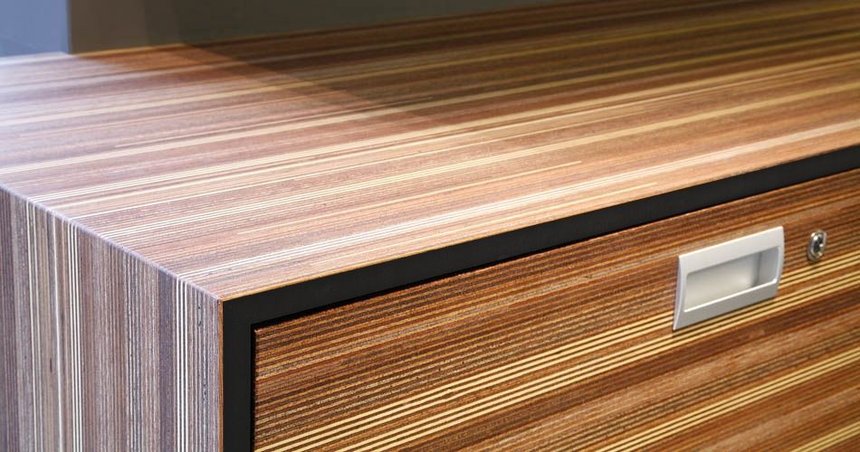 Plexwood® Pet Clinic Deventer detail of drawer with black mdf in meranti vertical cut plywood veneer