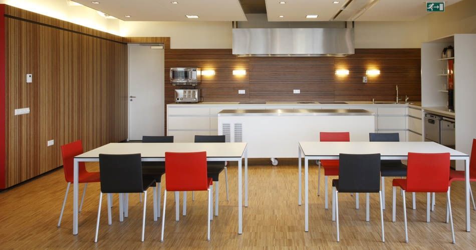 Plexwood® Rutges kitchen back wall and canteen interior wall cladding in meranti edge-grain veneer paneling