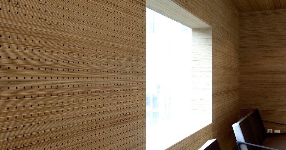 Plexwood® St. Olav's architectonical wall with window in perforated birch re-clamped edge-grain plywood veneer