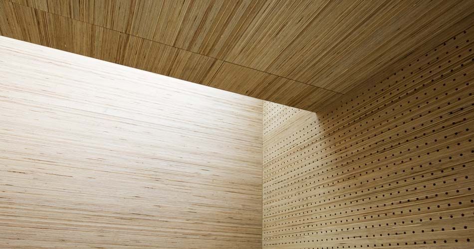 Plexwood® St. Olav's ceiling detail with cnc routed acoustic perforations with birch stacked veneer ply paneling