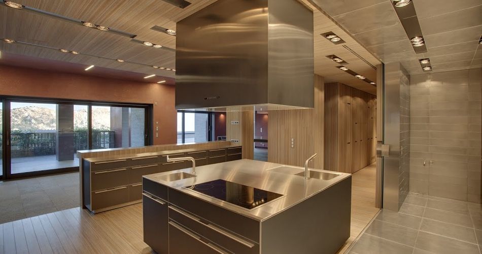 Plexwood® Villa Las Brisas residential kitchen floor with open hallway storage cabinets in meranti technowood veneer