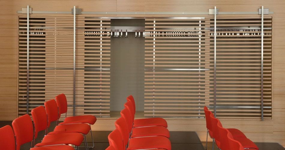 Plexwood® WBG Erfurt wall with integrated wardrobe semi-transparant feature slider doors of resurfacing beech veneers
