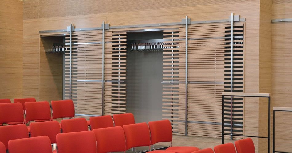 Plexwood® WBG Erfurt integrated wardrobe semi-transparant half-open feature doors from stacked standing plywood