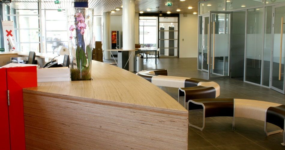 Plexwood® Zeeburg Community District Office friendly curved reception viewed from the top in birch re-ply veneers